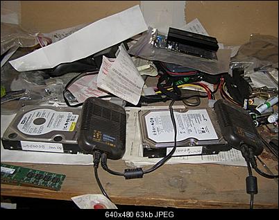 Click image for larger version

Name:	Two 500GB hard drives on second shelf SM.JPG
Views:	257
Size:	63.5 KB
ID:	2842